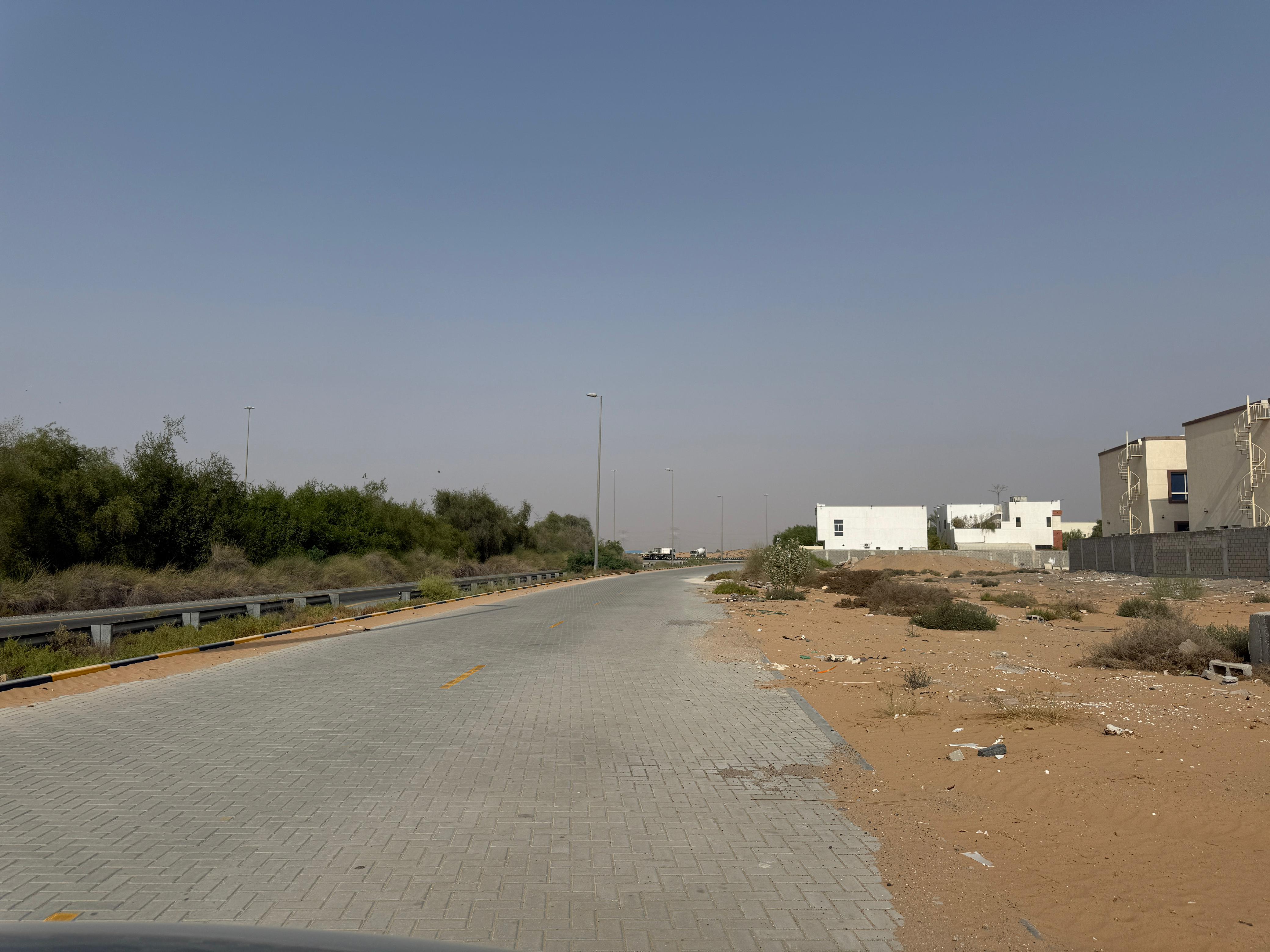 IN Al zahya Commercial Villa Plot 3500 SQFT On high way .