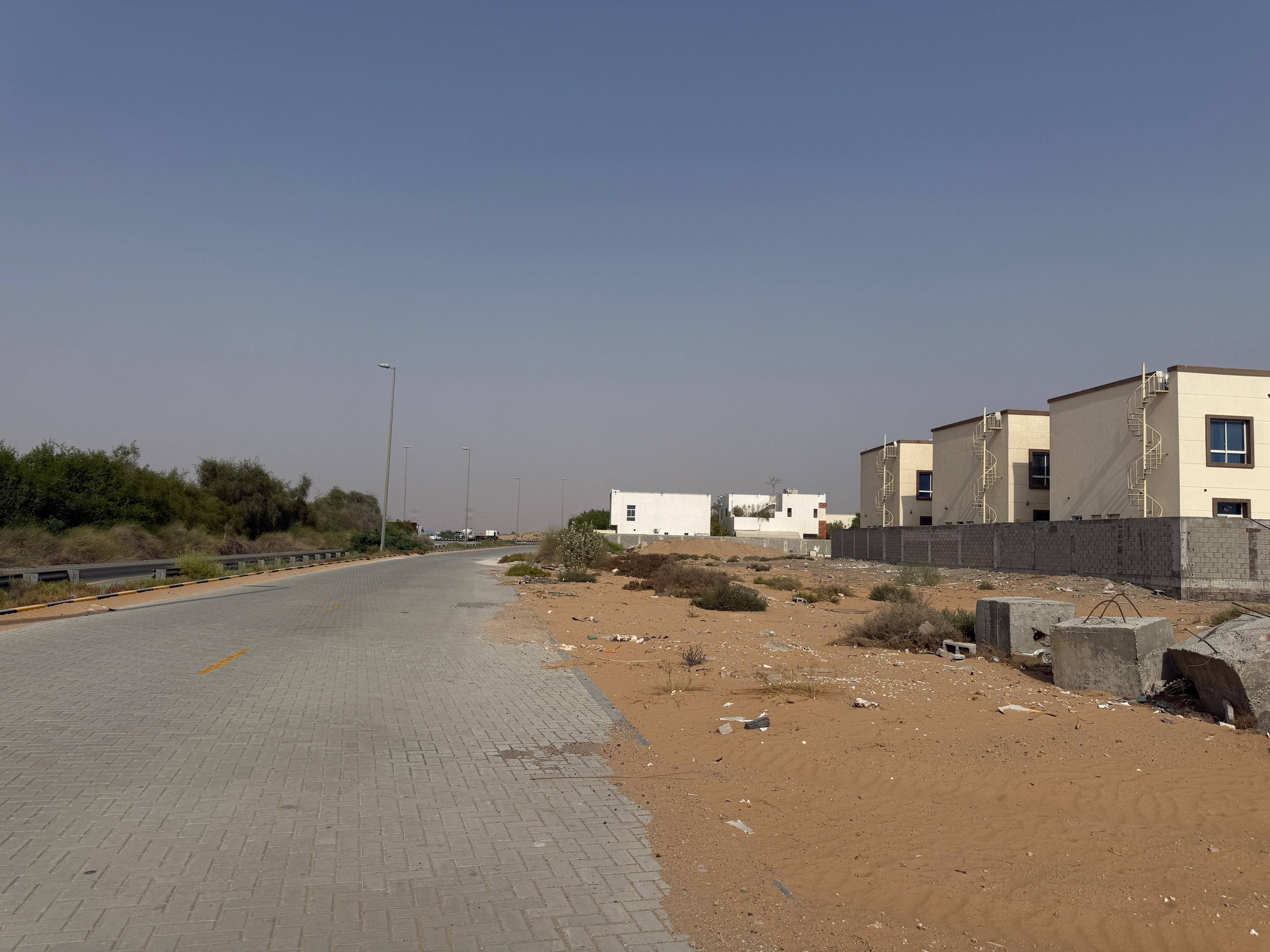 IN Al zahya Commercial Villa Plot 3500 SQFT On high way .