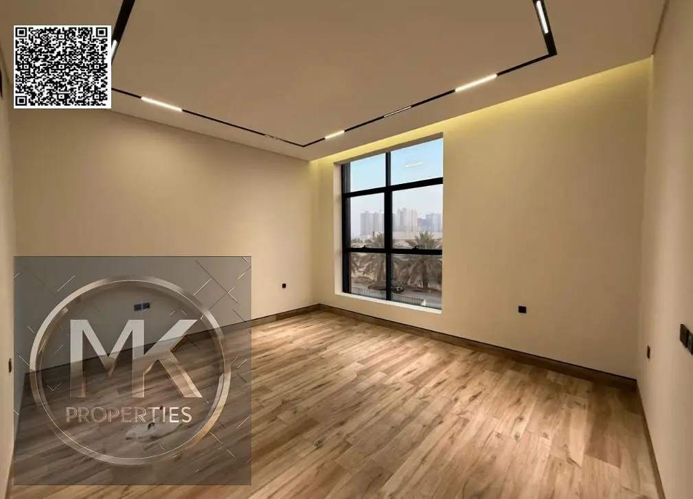 Luxury Villa for Sale in Al Alia – Modern Design & Prime Location Elegant stone façade Modern entrance