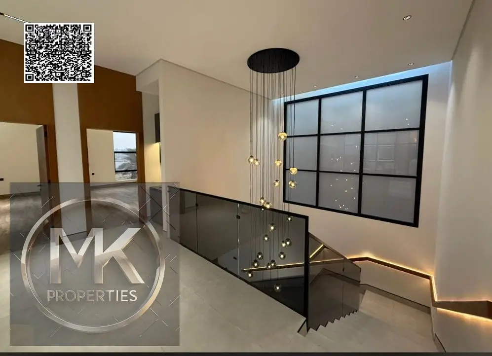 Luxury Villa for Sale in Al Alia – Modern Design & Prime Location Elegant stone façade Modern entrance