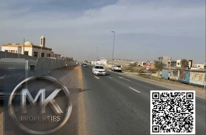 Commercial Plot for Sale – Prime Location Location IN Al HELIO 2 ON Main Road, directly in front of Azha Community.