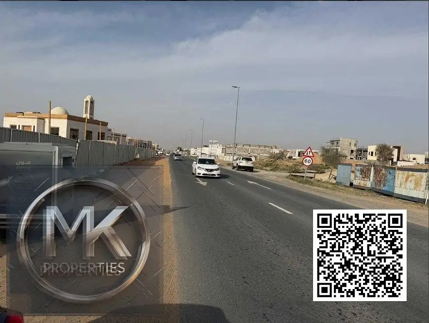 Commercial Plot for Sale – Prime Location Location IN Al HELIO 2 ON Main Road, directly in front of Azha Community.