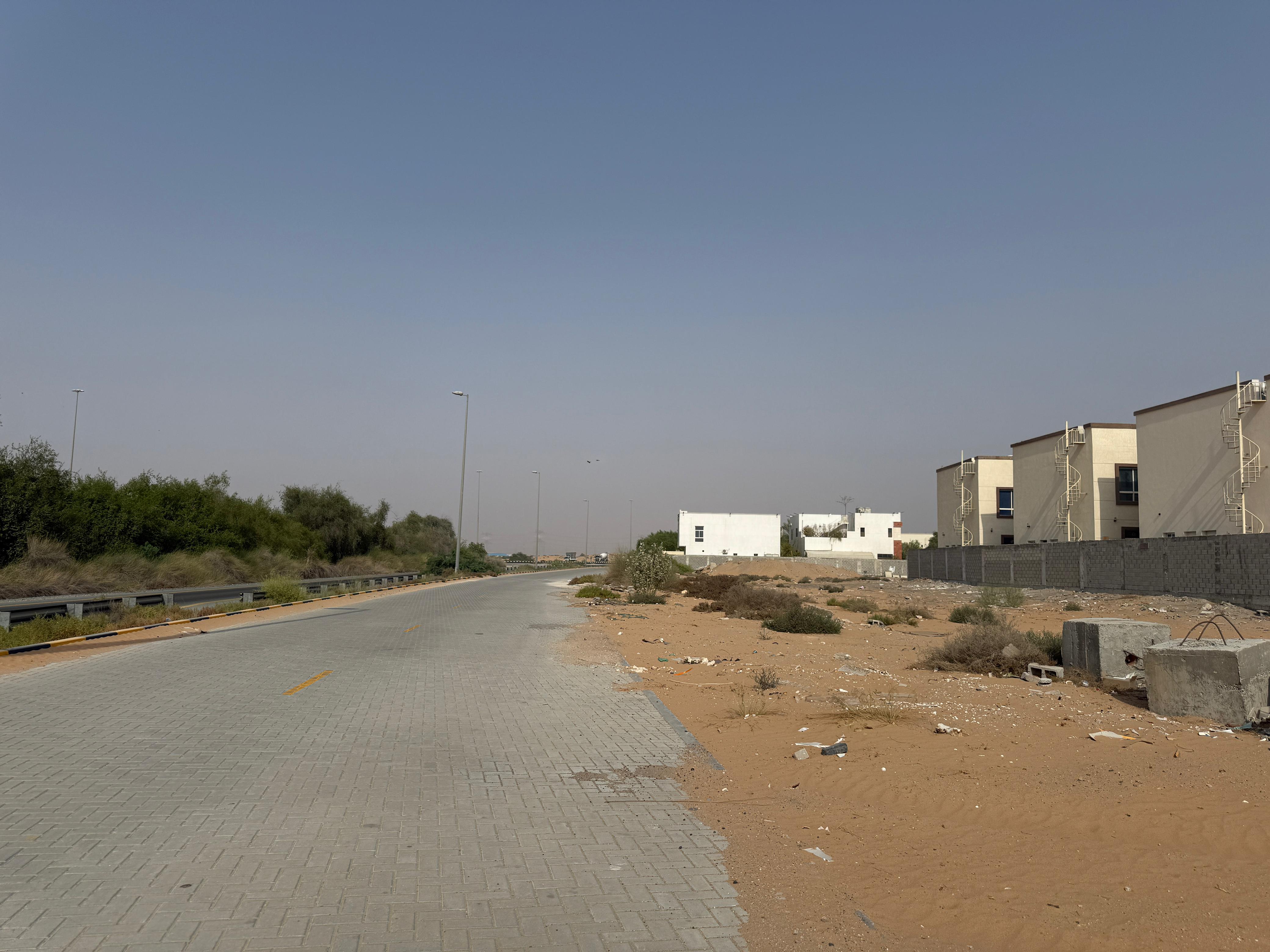 IN Al zahya Commercial Villa Plot 3500 SQFT On high way .